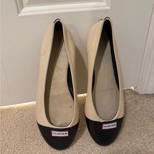 Hunter Cream and Black Flats for Everyday Comfort